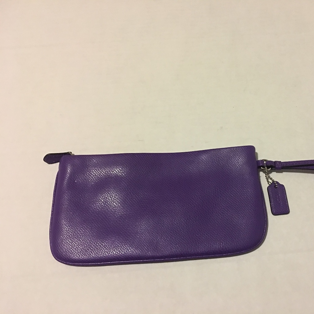 Coach wristlet Purple. Must Go Make Offer !